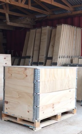 Pallet de madera equipado con cajones o collares para almacenamiento y transporte